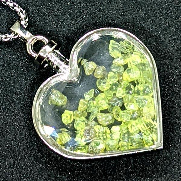 Peridot Chips in Beveled Glass heart on stainless steel chain